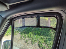 Load image into Gallery viewer, Sprinter Van 2007- Present Bug-out 2.0 cab window vent screen insert. Sold as Sets
